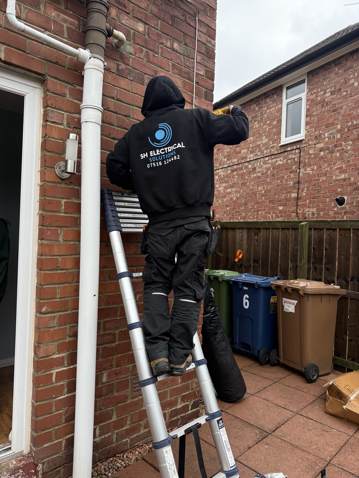 SH Electrical Solutions electrician at work
